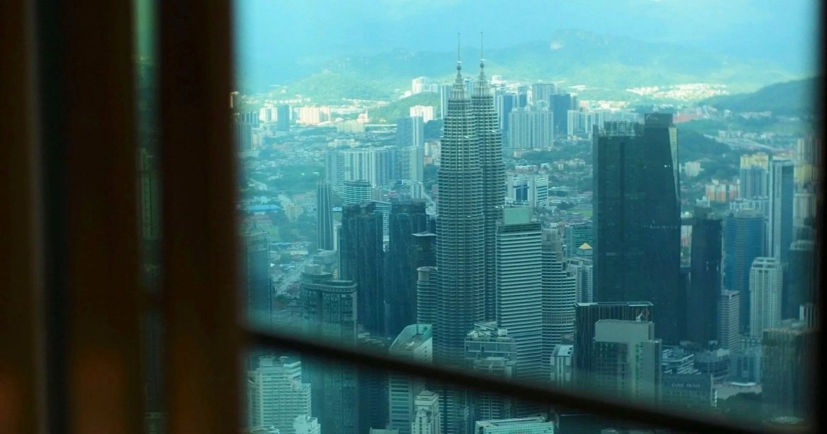 The Petronas Towers and Kuala Lumpur skyline seen from a window at Park Hyatt Kuala Lumpur
