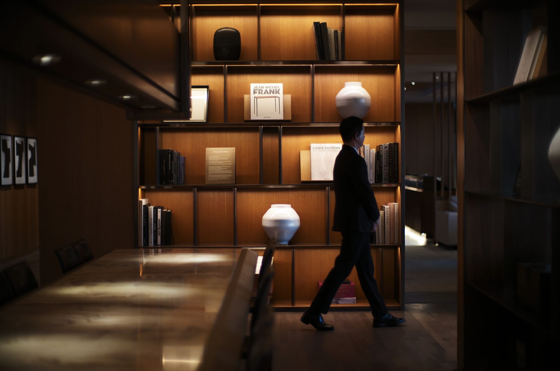Moon jars by Park Young-sook on the lit shelves of The Shilla Seoul